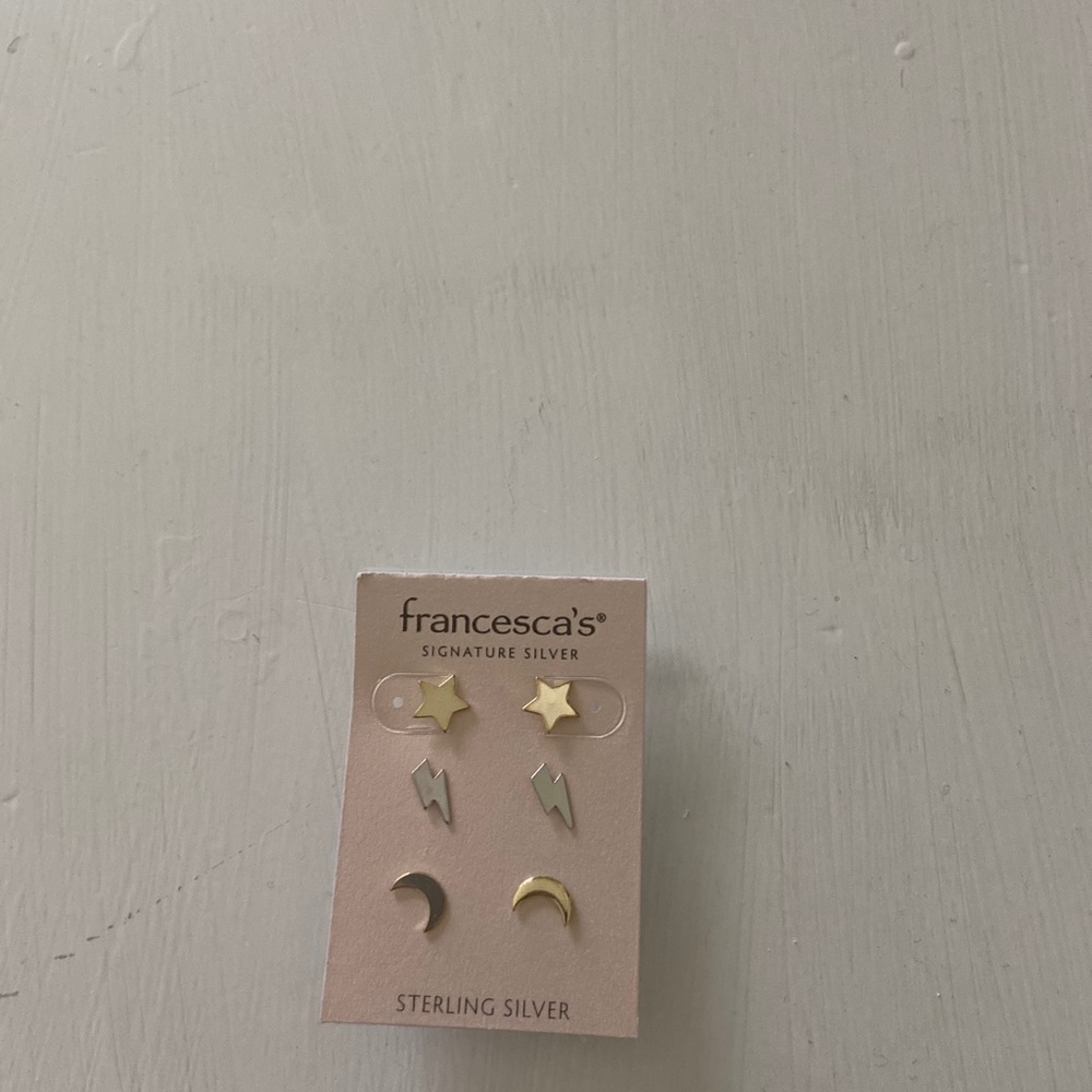 Signature silver and sterling silver earrings.